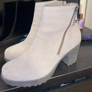 Beige colored waterproof heeled booties